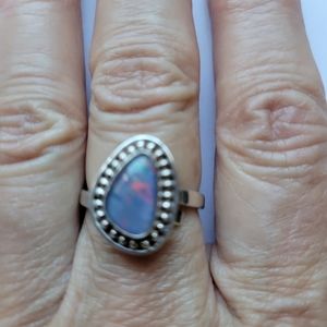Beautiful artisan crafted silver and Boulder opal ring
